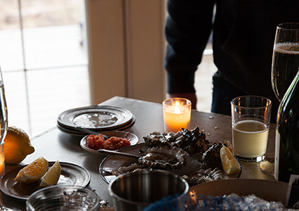 table with dishes of food and drinks